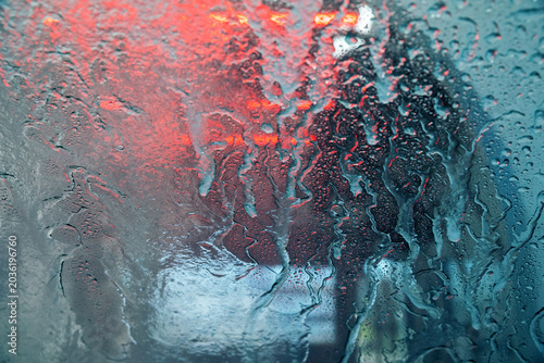 View from inside a car of a wet windshield in an automatic car wash.