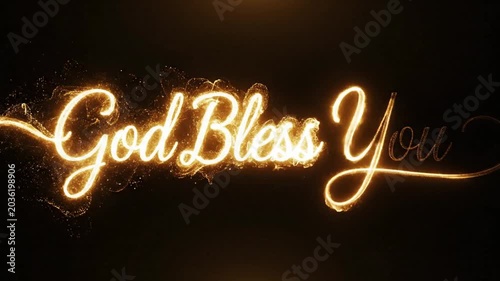 A glowing, ethereal script of 'God Bless You' shimmers against a dark, smoky background, evoking a sense of divine benediction and spiritual warmth.