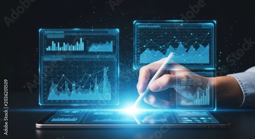 Business professional analyzing financial data on futuristic digital screens with glowing charts
