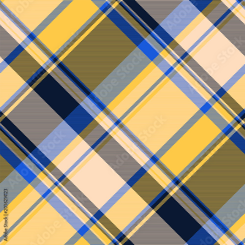 Bold plaid pattern in golden yellow, navy, and blue tones, creating a timeless yet modern vibe. Ideal for fashion, design, or decorative backgrounds.