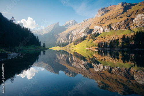 Switzerland mountain scenery at iconic Seealpsee lake in fall, Appenzellerland, Switzerland
