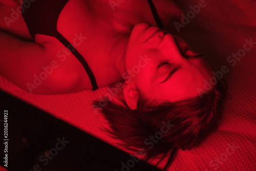 Woman getting red light therapy for skin wellness