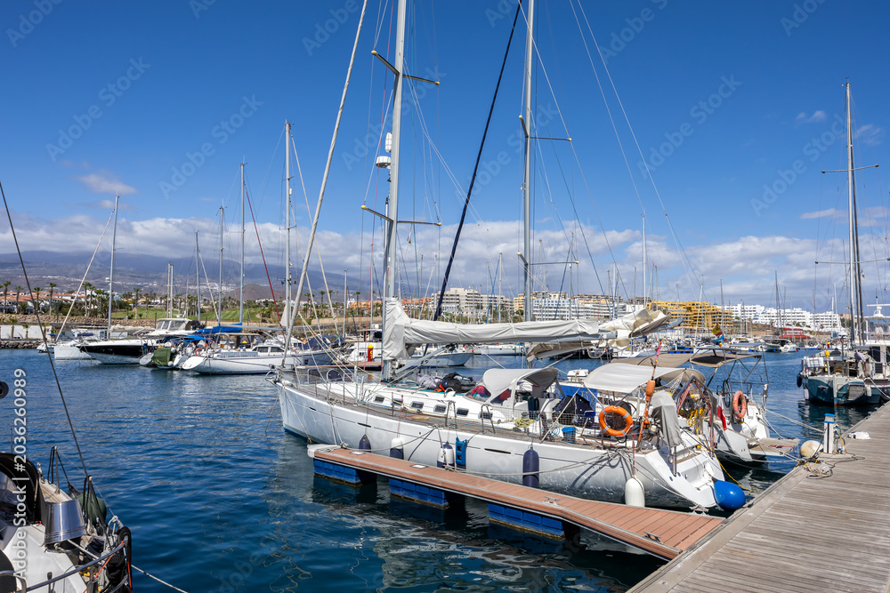 Fototapeta premium Sailboats in marina on Tenerife island vacation in San Miguel de Abona, Spain