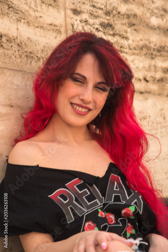 Young woman smiling with closed eyes wearing relax shirt