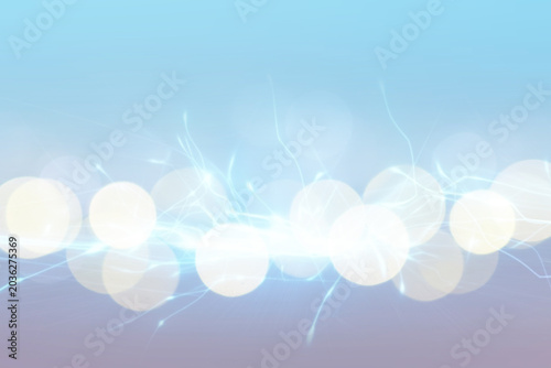 Abstract background of light blue shades with glare and bokeh effect.