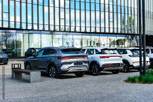 New Chinese cars parked in row at dealership parking lot, brand new cars for sale.