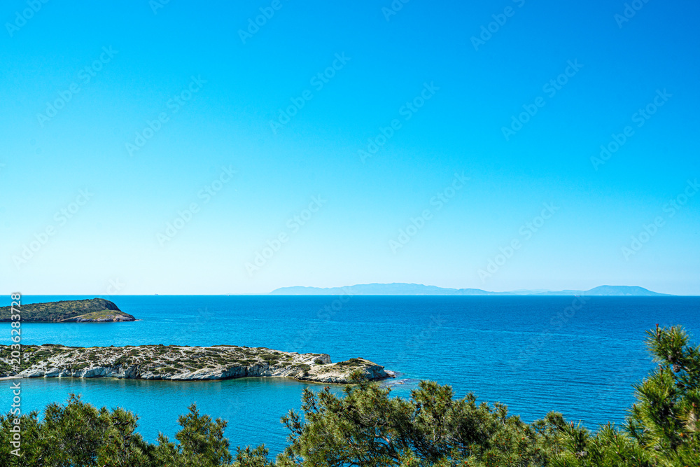 Obraz premium The scenic views of Foça (Phokaia) with its historical wonders and natural beauty, beaches, islands, and bays, are situated on the beautiful Aegean coastline just 70 kilometers north of İzmir, Turkey.