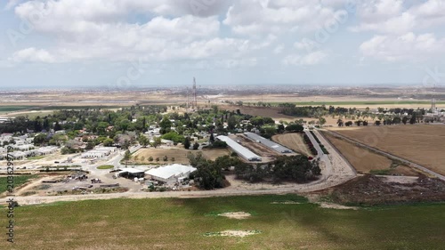 Aerial View Of Nir Oz Near Gaza Border Israel
Drone footage overlooking Nir Oz kibbutz and Shujaiyya Gaza skyline May 26 2026 Israel
