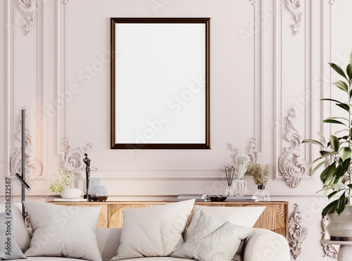 Bright luxury living room interior with elegant wall moldings, tufted sofa and poster mockup frame.