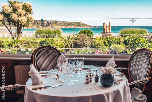 dinner table near windows, Jersey Island nature and seacoast, UK