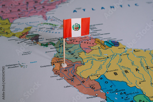 Fotografie A small Peruvian flag pin placed on a map of South America, representing upcoming national elections and the democratic voting process in Peru