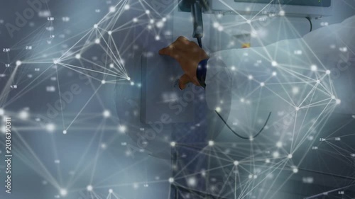 Medic hand reaching and rotating wall unit handle as network overlay drifts, calibrating device