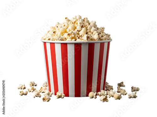 Bucket of popcorn in a red container isolated on white background, tasty cinema snack for movies and entertainment