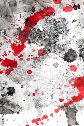 Black and red ink paint background with abstract swirls and splatters creative