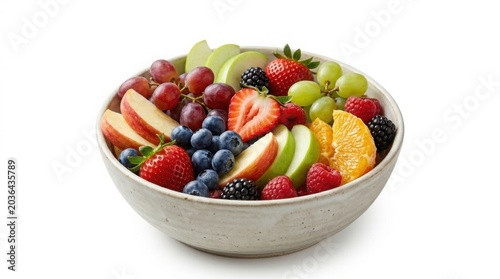 Fresh fruit bowl with assorted berries and sliced citrus on white background
