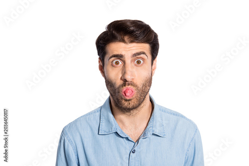 Canvas Print Photo of multiethnic impolite guy sticking tongue out of mouth teasing girlfrien