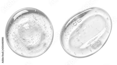 Two transparent clear gel serum drops with visible air bubbles on a transparent background, close-up texture of viscous cosmetic liquid