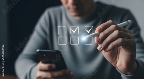 Man holding smartphone and stylus, checking off tasks on a digital to-do list with glowing checkmarks