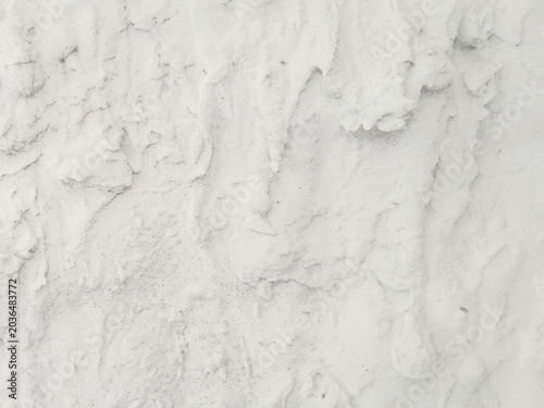 Bild auf Leinwand Close-up of a white salt surface with a crystalline rough texture
