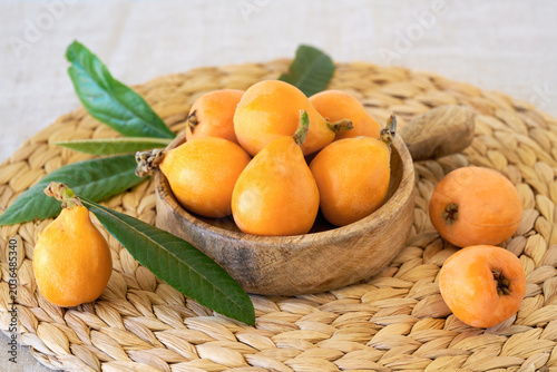 Loquats fruits with green leaves