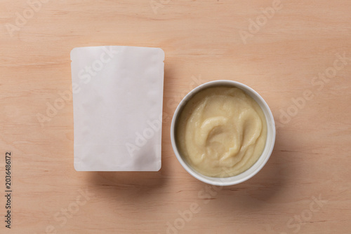 Still life of dummy food packaging for baby food.