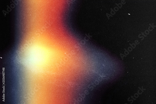 light leak overlay effect with scratch dust and blur orange light leaks,retro noisy film texture light leak flare on black background,abstract background with light,grunge old film burn