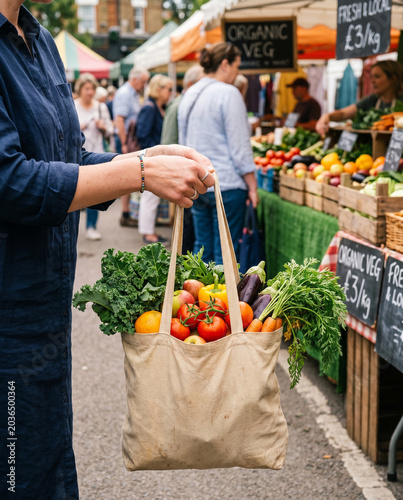 Elegant local market shopping with fresh produce and reusable bag