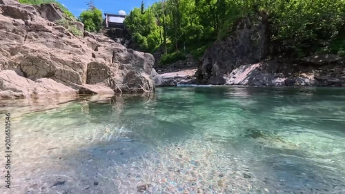 In the woods, immersed in nature. Above and below the water. Pristine nature and crystal-clear waters. Torre Torre in Friuli.