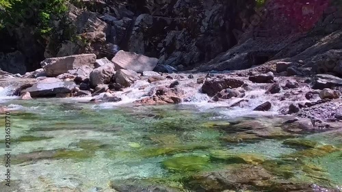 In the woods, immersed in nature. Above and below the water. Pristine nature and crystal-clear waters. Torre Torre in Friuli.