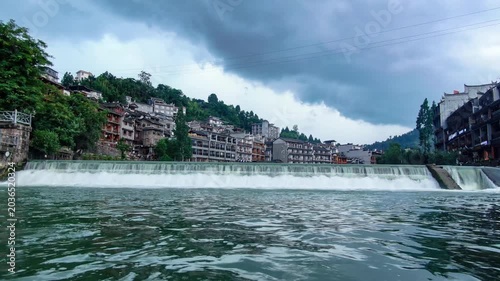 Storm Clouds Over Fenghuang Ancient Town Waterfall in Hunan China in Fenghuang, Hunan, China