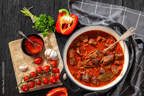 Beef goulash stew with paprika in ceramic pot