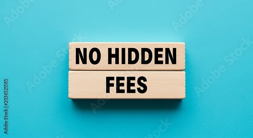 No hidden fees text on wooden blocks, transparent pricing concept for banking and finance, honest business service message on blue background