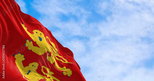 Fotografie Close-up of of Normandy flag waving in the wind on a clear day