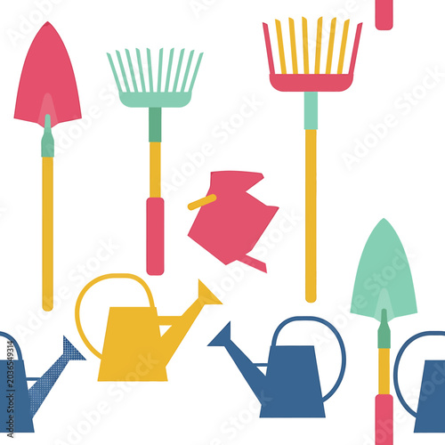 Colorful gardening tools and watering cans.