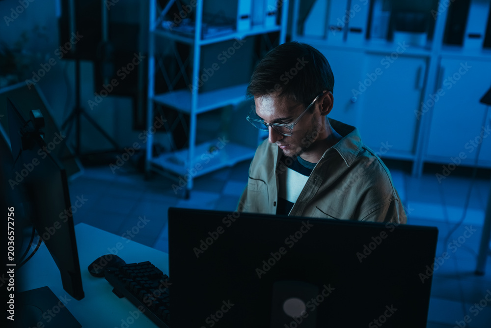 Fototapeta premium Cyber Security Analyst Monitoring Threat Detection Dashboard And Network Security Operations During Late Night Data Protection And Digital Infrastructure Defense