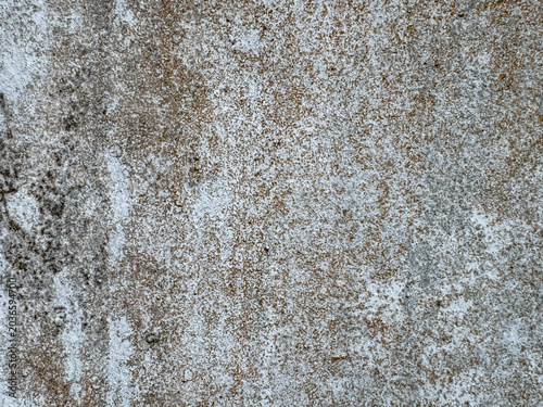 Obraz na płótnie Textured urban wall surface revealing years of organic erosion and subtle pigmen