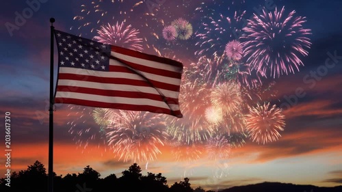 Waving American Flag with Colorful Fireworks Display During Beautiful Sunset Sky
