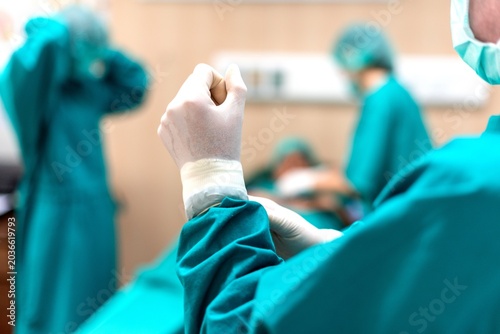 Photos Surgical team preparing for operation.