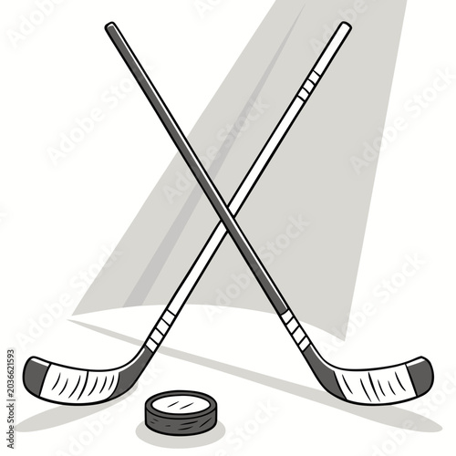Photography Two crossed ice hockey sticks with a puck on the ice rink floor, equipment