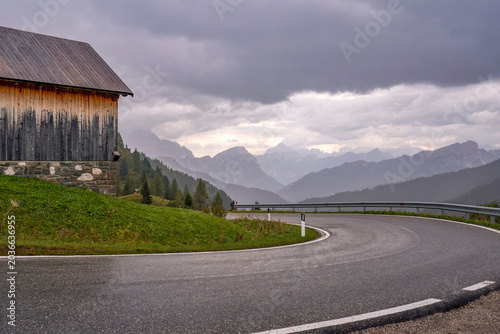  Road in the Dolomite Alps on a cloudy autumn day        