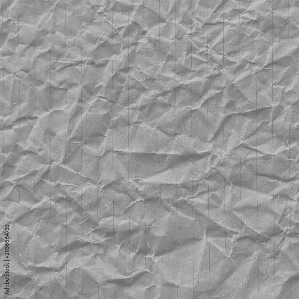 Fototapeta premium Crumpled textured paper background with copy space