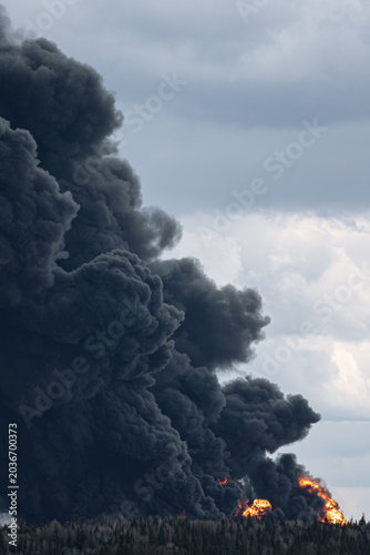 Photos Black smoke billowing from a landfill fire, showing dangerous atmospheric pollut