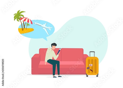 A man is sitting on a couch while looking at a smartphone. He is thinking about traveling and enjoys the idea of a beach vacation. A suitcase sits beside him, showing his travel plans.