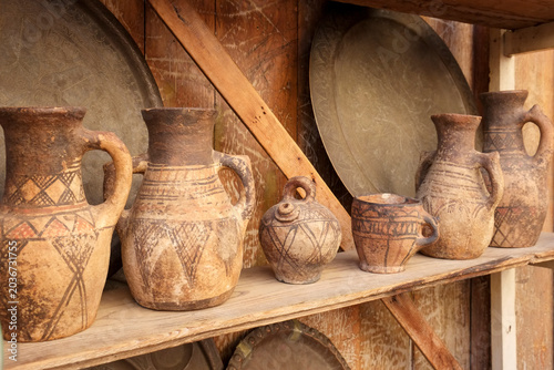 Fes, Morocco Antique clay jugs on a shelf