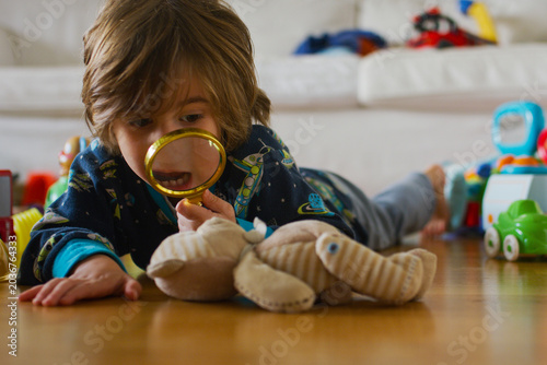 фотографія Young child lying on the floor