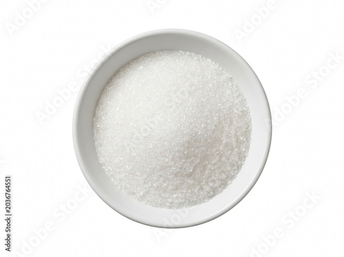 Tableau sur toile Granulated white sugar in a white ceramic bowl viewed from above