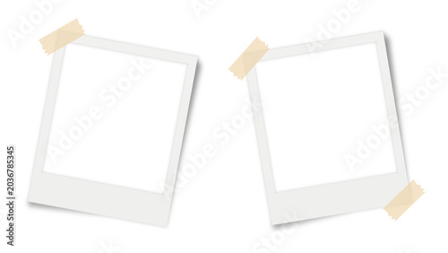 Set of two angled white polaroid photo frames with tan masking tape isolated on transparent background realistic mockup for memory album and digital collage.