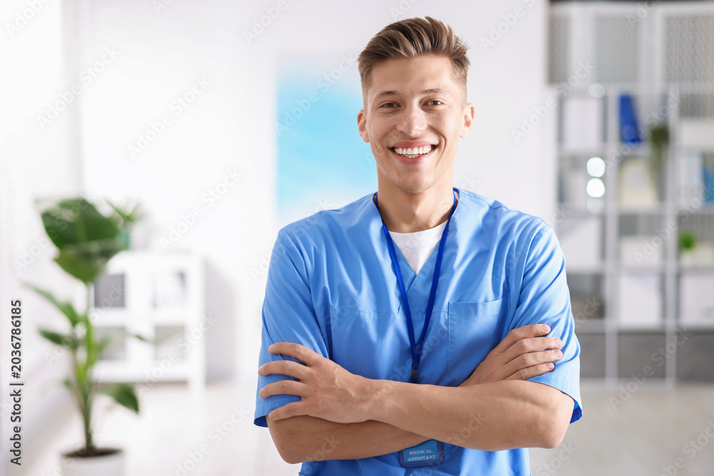 Fototapeta premium Portrait of medical assistant in scrubs at clinic