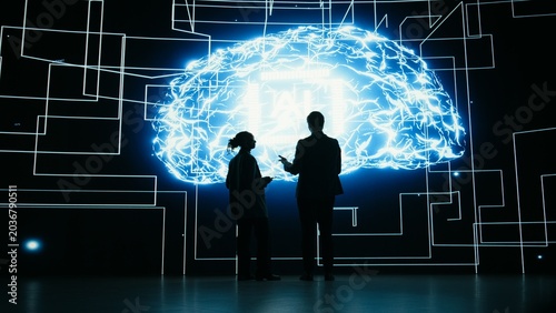 Tableau sur toile Engineering team implements digital guardrails on autonomous AI agent to limit risk, Teamworking tech startup colleagues apply artificial intelligence safety constraints, brainstorming, camera A