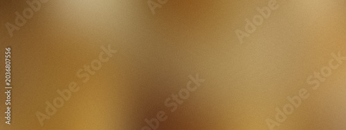 soft blurred gradient of golden hues, abstract grainy background